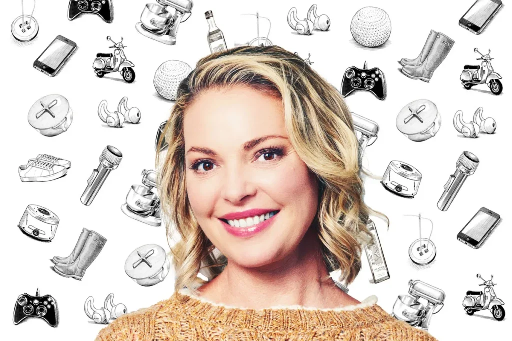 Katherine Heigl in front of household icons backdrop
