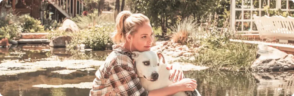 Katherine Heigl hugging dog
